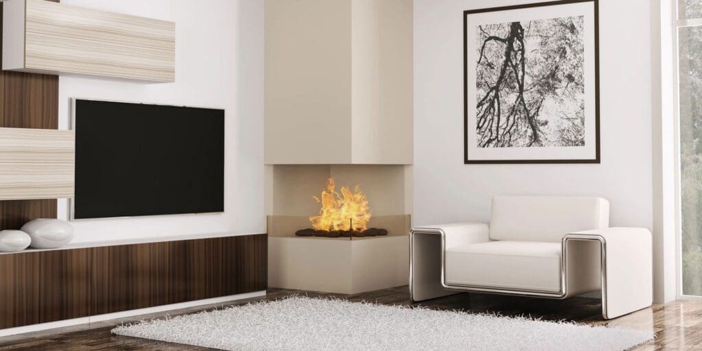 A living room with a fireplace and a white couch