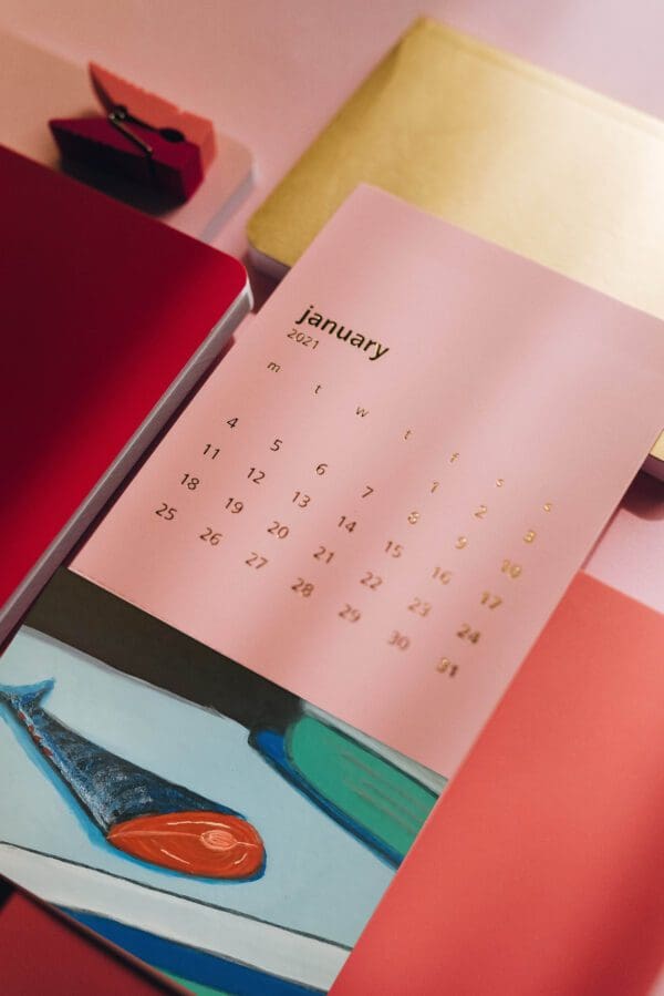 A close up of the calendar page on a table