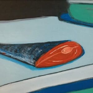 A painting of a fish on top of a table.
